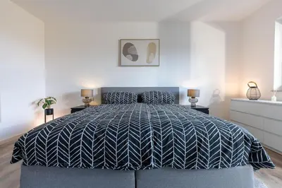 Ein Bett oder Betten in einem Zimmer der Unterkunft Vulkan-Loft