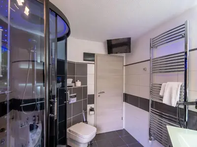 Ein Badezimmer in der Unterkunft Exclusive holiday apartment with volcano views
