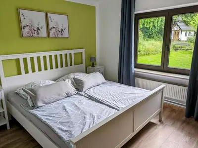 Ein Bett oder Betten in einem Zimmer der Unterkunft Pulgersmühle, EG