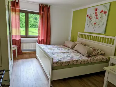 Ein Bett oder Betten in einem Zimmer der Unterkunft Pulgersmühle, EG