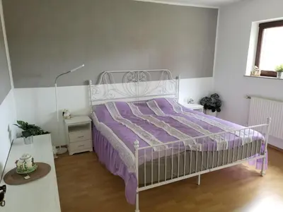 Ein Bett oder Betten in einem Zimmer der Unterkunft Ferienwohnung Mosel Hunsrück