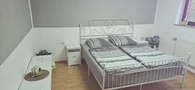 Ein Bett oder Betten in einem Zimmer der Unterkunft Ferienwohnung Mosel Hunsrück