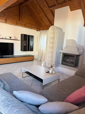 Ein Sitzbereich in der Unterkunft Ferienwohnung Lodge 43