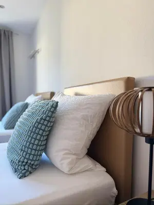 Ein Bett oder Betten in einem Zimmer der Unterkunft Ferienwohnung Lodge 43