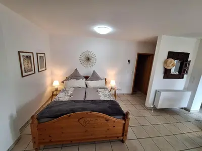 Ein Bett oder Betten in einem Zimmer der Unterkunft Ferienwohnung Funk
