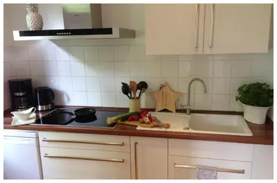 Küche/Küchenzeile in der Unterkunft Appartement am Oranienpark im Kurviertel