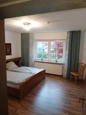 Ein Bett oder Betten in einem Zimmer der Unterkunft Ruhige Ferienwohnung im Hunsrück