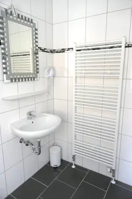 Ein Badezimmer in der Unterkunft Hotel Briedeler Haus