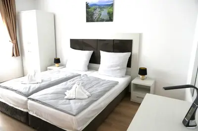 Ein Bett oder Betten in einem Zimmer der Unterkunft Hotel Briedeler Haus