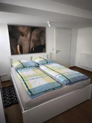 Ein Bett oder Betten in einem Zimmer der Unterkunft Wohnung in Mülheim-Kärlich