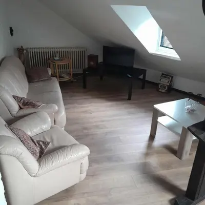 Ein Sitzbereich in der Unterkunft Ferienwohnung 