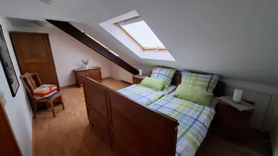 Ein Bett oder Betten in einem Zimmer der Unterkunft Ferienwohnung 
