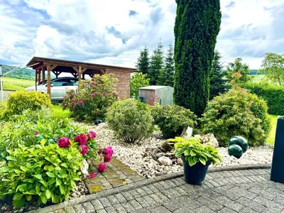 Ein Garten an der Unterkunft Wohlfühloase an der Mosel