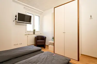 Ein Bett oder Betten in einem Zimmer der Unterkunft Landküche - Ferienwohnung