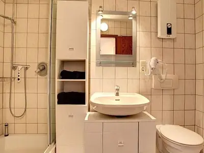 Ein Badezimmer in der Unterkunft Uitzicht op het meer - formerly TUI