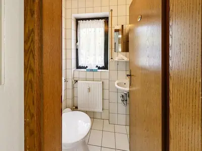 Ein Badezimmer in der Unterkunft Uitzicht op het meer - formerly TUI