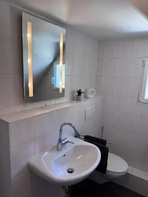 Ein Badezimmer in der Unterkunft Ferienwohnung direkt an der Mosel im Zentrum von Zell