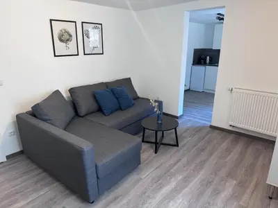 Ein Sitzbereich in der Unterkunft Ferienwohnung direkt an der Mosel im Zentrum von Zell