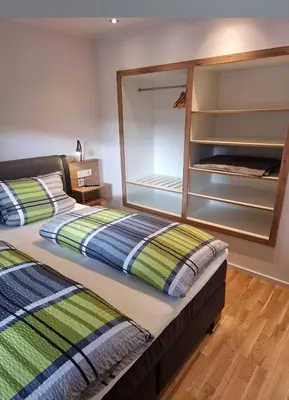 Ein Bett oder Betten in einem Zimmer der Unterkunft Gasthaus Korneli
