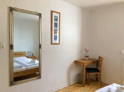 Ein Bett oder Betten in einem Zimmer der Unterkunft Ferienhaus Schwanennest