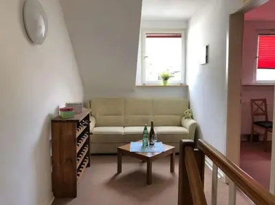Ein Sitzbereich in der Unterkunft Ferienhaus Schwanennest