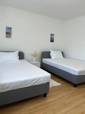Ein Bett oder Betten in einem Zimmer der Unterkunft Ferienwohnung in Gerolstein Zentrum