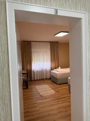 Ein Bett oder Betten in einem Zimmer der Unterkunft Repeat Racing Rooms