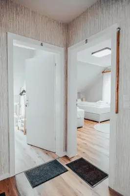 Ein Bett oder Betten in einem Zimmer der Unterkunft Repeat Racing Rooms