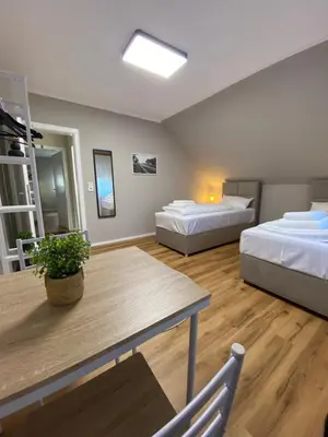 Ein Bett oder Betten in einem Zimmer der Unterkunft Repeat Racing Rooms