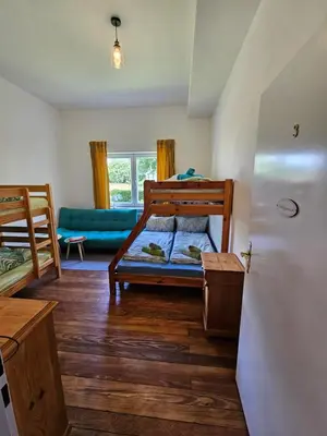 Ein Bett oder Betten in einem Zimmer der Unterkunft Alte Schule Kail - Wohnung 1