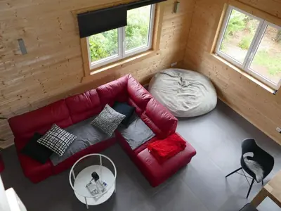 Ein Sitzbereich in der Unterkunft Holiday home family Junk