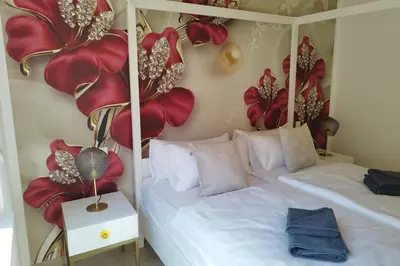Ein Bett oder Betten in einem Zimmer der Unterkunft Apprimus Ferienwohnungen - Waldsee Rieden Panoramaterrasse 2 EG