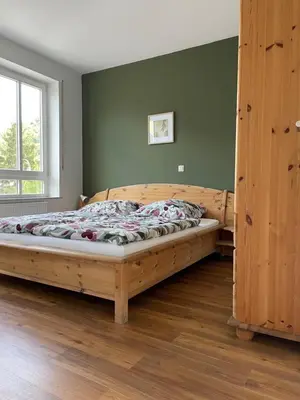 Ein Bett oder Betten in einem Zimmer der Unterkunft Ferienwohnung Röttgen
