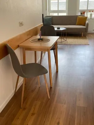 Ein Sitzbereich in der Unterkunft Ferienwohnung Röttgen