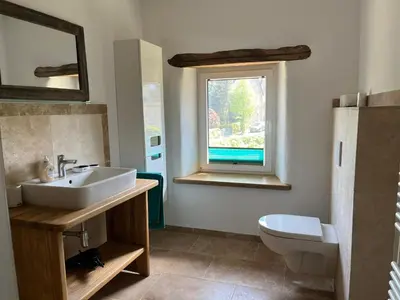 Ein Badezimmer in der Unterkunft 