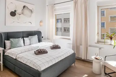 Ein Bett oder Betten in einem Zimmer der Unterkunft Modern Stay I Cosy & Central Apartments