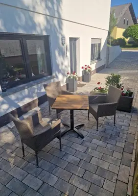 Ein Sitzbereich in der Unterkunft Ferienwohnung Katharina