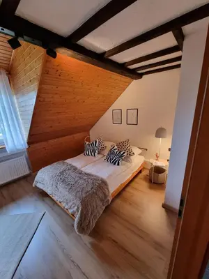 Ein Bett oder Betten in einem Zimmer der Unterkunft Schwalbennest