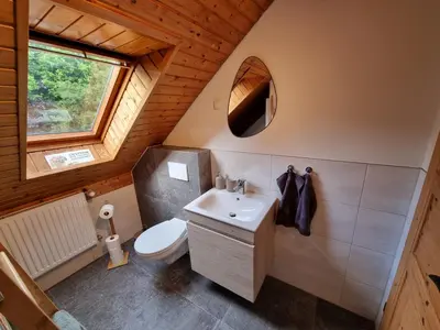 Ein Badezimmer in der Unterkunft Schwalbennest