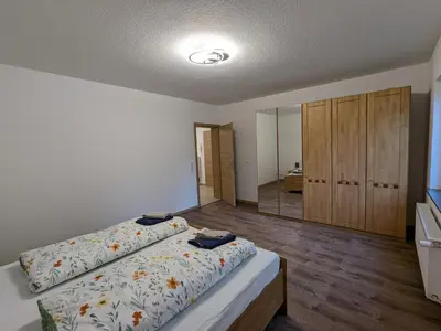 Ein Bett oder Betten in einem Zimmer der Unterkunft Ferienwohnung Staeves