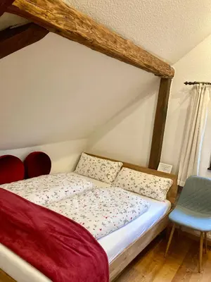 Ein Bett oder Betten in einem Zimmer der Unterkunft Turmstube