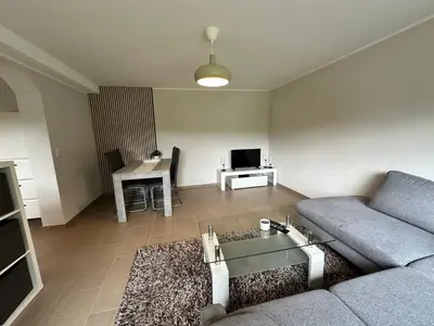 Ein Sitzbereich in der Unterkunft Ferienwohnung Morgenblüte