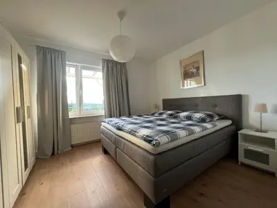 Ein Bett oder Betten in einem Zimmer der Unterkunft Wohnung mit schönem Aussicht