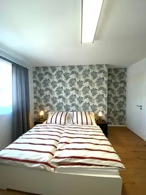 Ein Bett oder Betten in einem Zimmer der Unterkunft Naturnahe Wohnung in Zettingen A