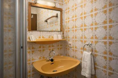 Ein Badezimmer in der Unterkunft Pension zur Quelle