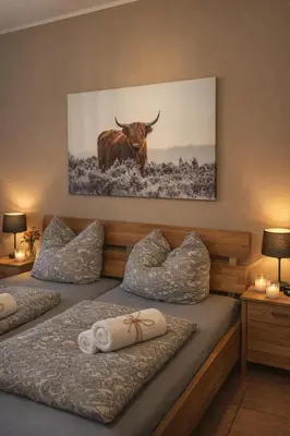 Ein Bett oder Betten in einem Zimmer der Unterkunft Pension zur Quelle