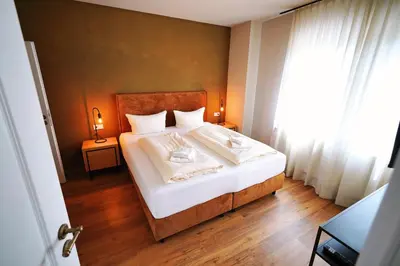 Ein Bett oder Betten in einem Zimmer der Unterkunft Winzerhaus am Kardinalsberg
