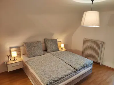 Ein Bett oder Betten in einem Zimmer der Unterkunft Ferienwohnung Paul & Jakob