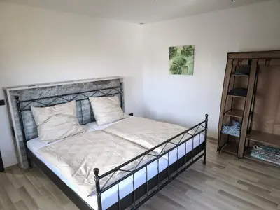 Ein Bett oder Betten in einem Zimmer der Unterkunft Ferienwohnung Paul & Jakob