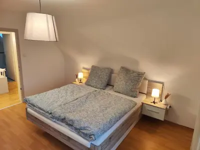 Ein Bett oder Betten in einem Zimmer der Unterkunft Ferienwohnung Paul & Jakob